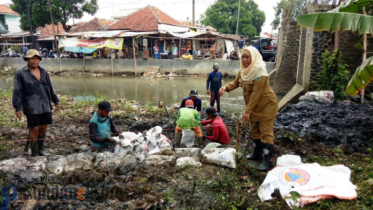 Pemkab Normalisasi Manual Kali Cigadung