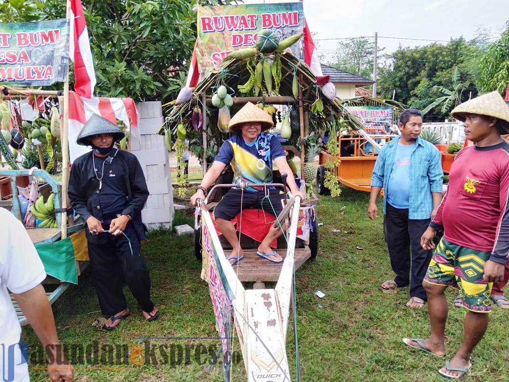 Warga Desa Sidamulya Sambut Musim Tanam Padi dengan Pawai Tracktor