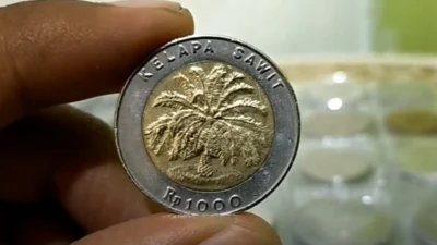 Daya Tarik Uang Koin Kelapa Sawit yang Diburu Kolektor Uang Kuno Saat Ini (image from screenshot Youtube seputar coin)