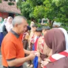 Disdukcapil Bersama DP2KBP3A dan FAGOR Bagikan KIA Kepada Siswa 