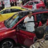 Presiden Jokowi Terpesona dengan Inovasi MG Motor di IIMS 2024